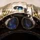 Those two things on the bottom that look like WALL-E eyes are projectors for the HUD. Above is the night vision system.
